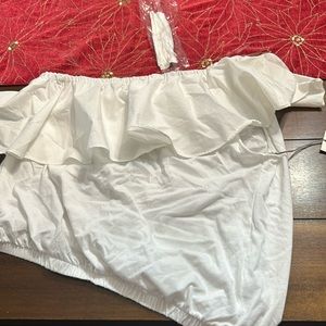 One shoulder white top